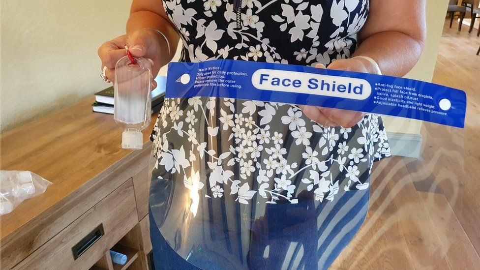 face shield and hand sanitiser