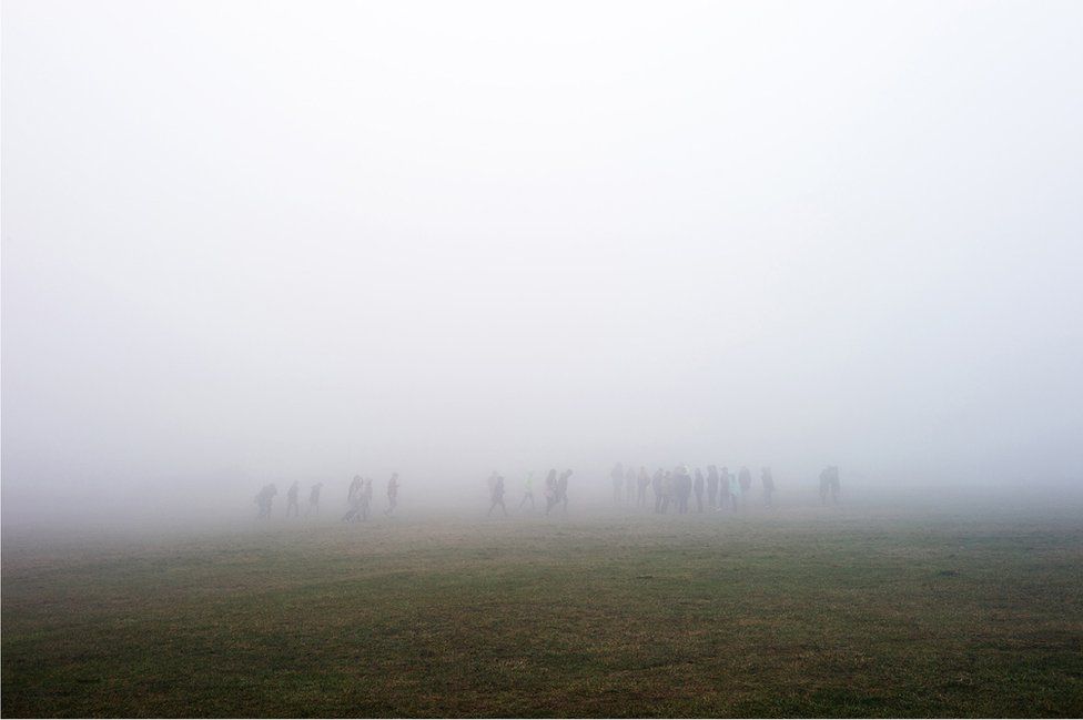 Figures in the mist