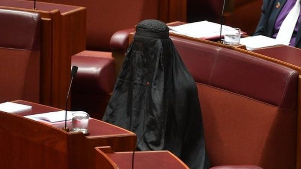 Pauline Hanson sits in Austalia's Senate wearing a burka