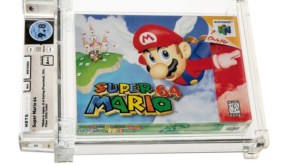 Super Mario 64 game sells for record-breaking $1.5m at auction - BBC News