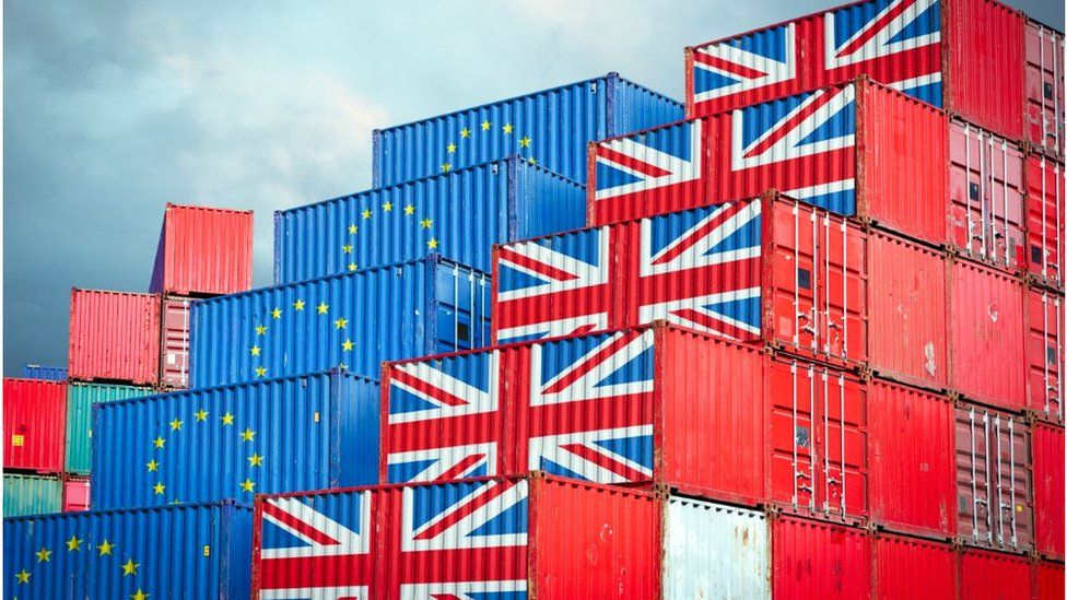 Shipping containers marked with EU and union flags
