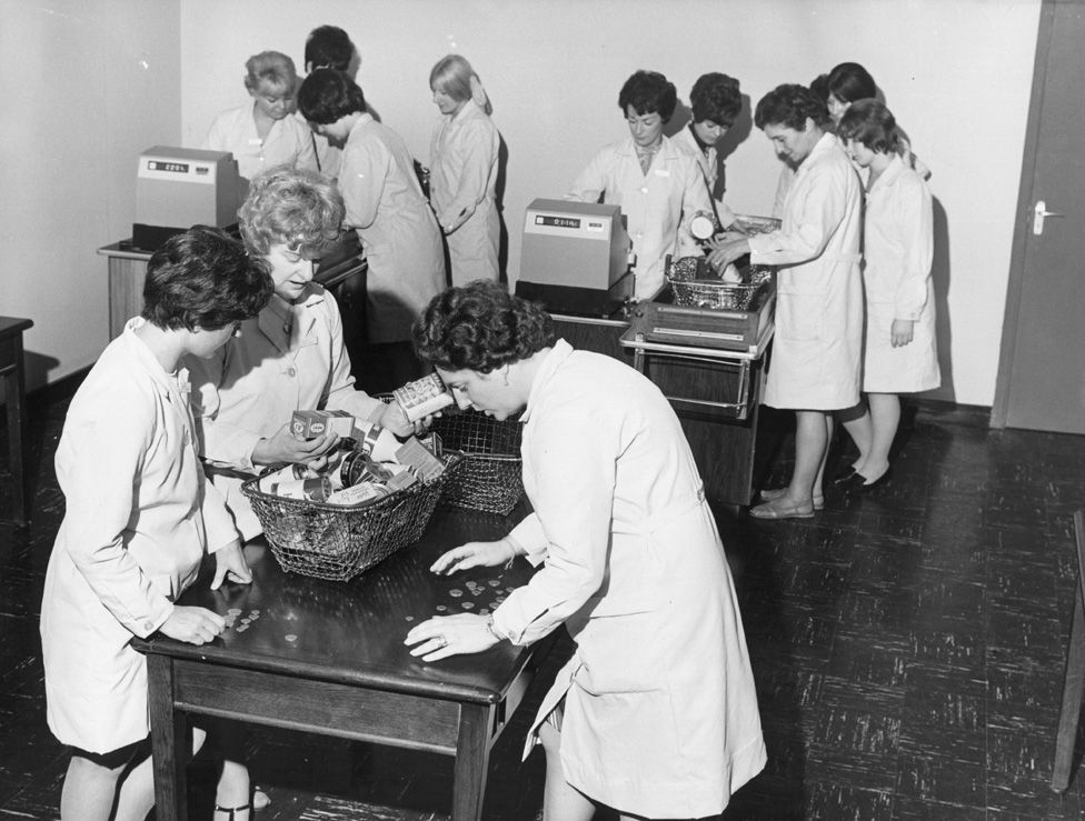 Fine Fare supermarket checkout women training in the use of the new decimal currency in 1968