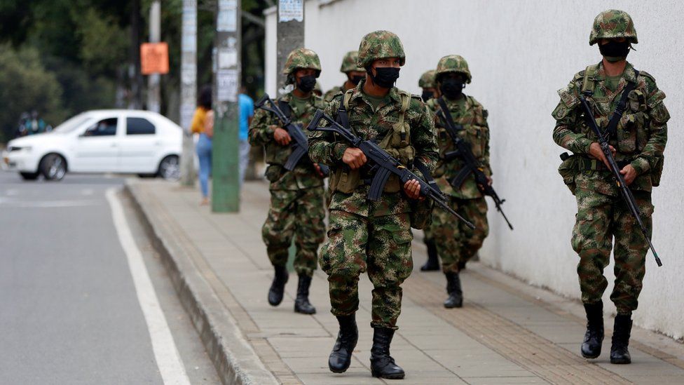 Soldiers guard the streets after Colombian President Ivan Duque ordered more military presence, one day after violent anti-government protests, in Cali, Colombia