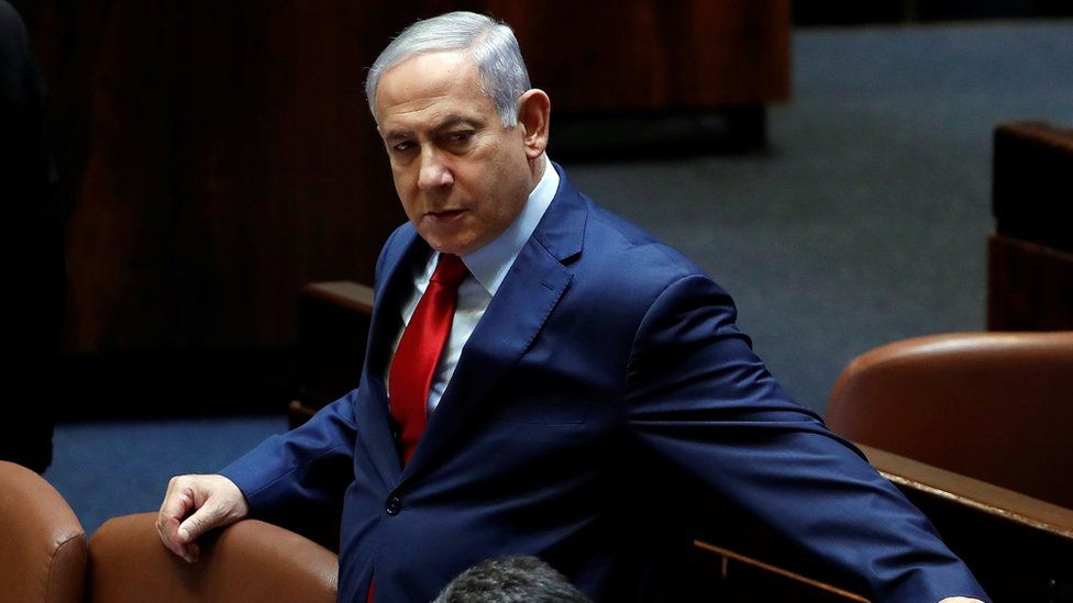 Israeli Prime Minister Benjamin Netanyahu arrives to the plenum at the Knesset