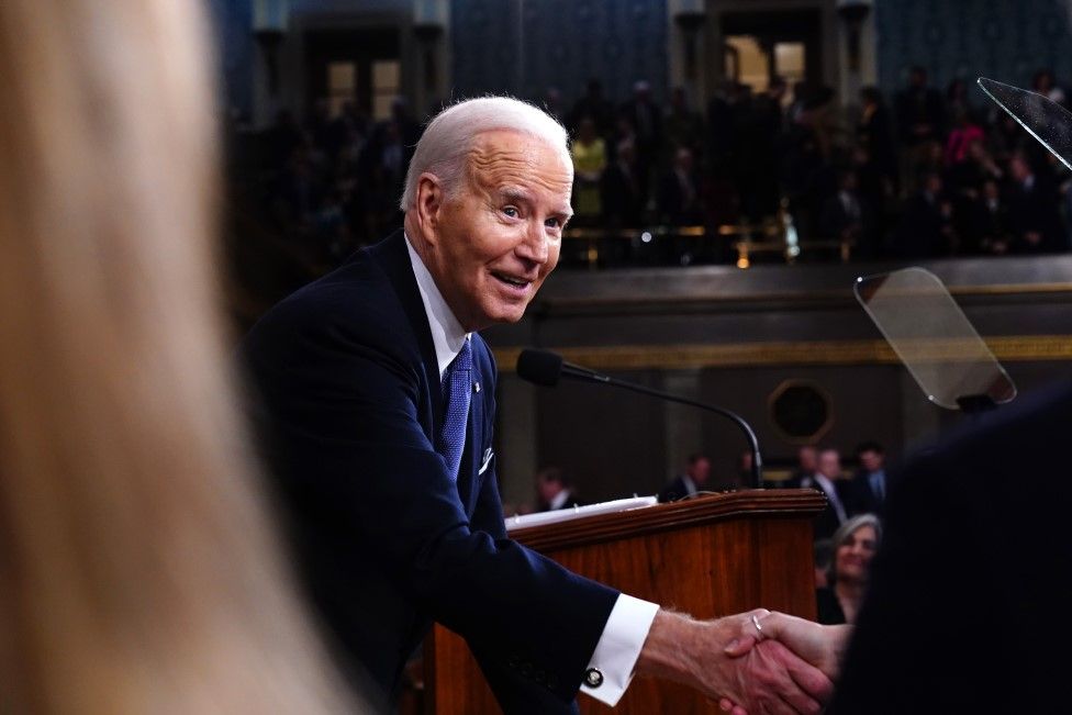 Biden shaking hands after speech