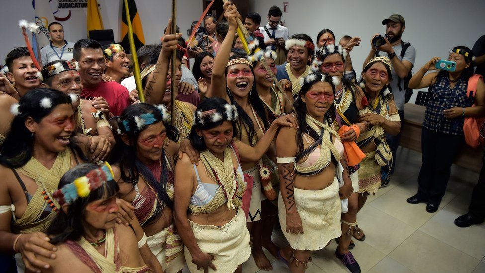 Waorani indigenous people celebrate after a court ruled in their favour on the tribe's legal challenge to the government's land selloff, at the end of the protection action hearing in Puyo, Ecuador, on April 26, 2019.