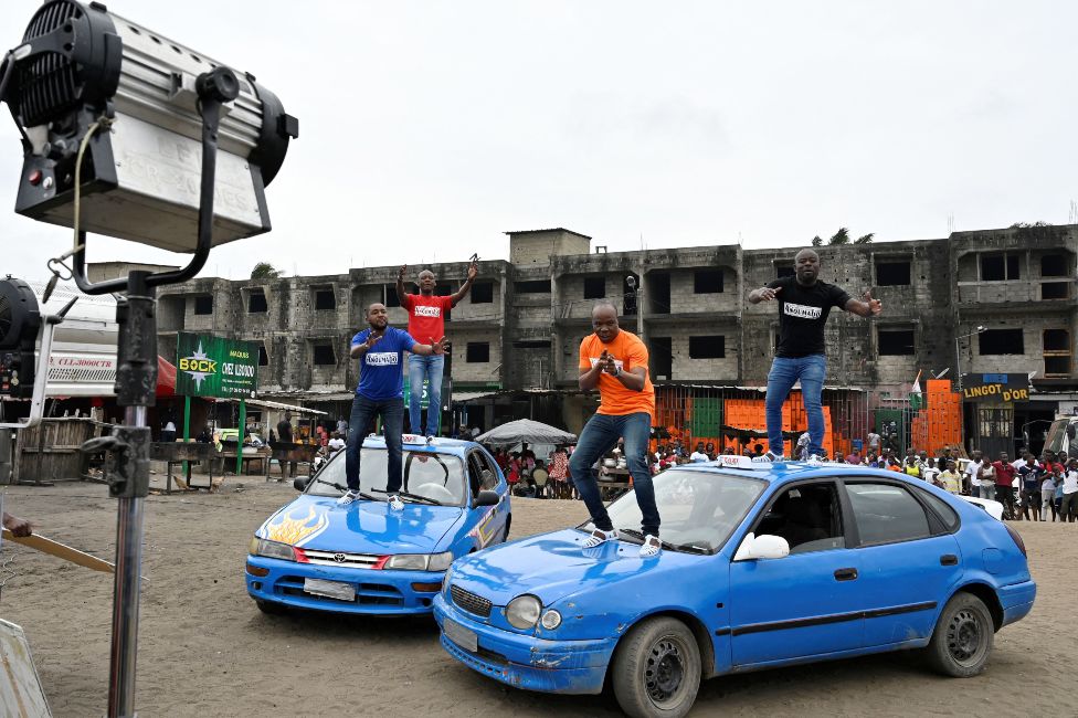 Members of Magic System being filmed in the Anoumabo neighbourhood of Abidjan, Ivory Coast - Sunday 8 August 2021