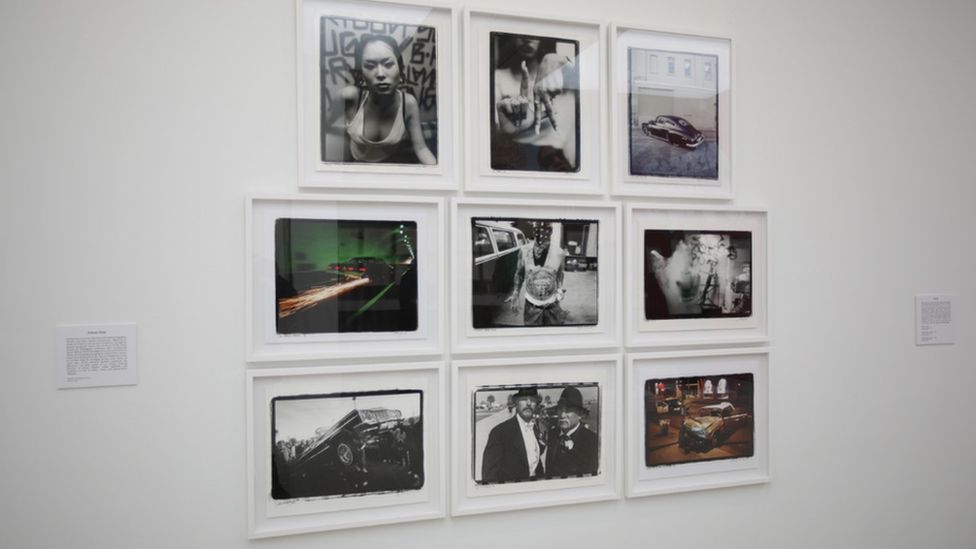 Nine of Estevan Oriol photos hung on display