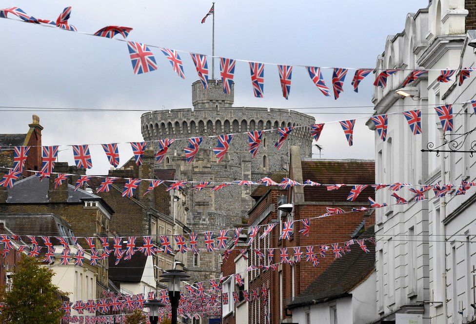 Bunting flutters in the wind in front of Windsor Castle, on the day before the royal wedding of Britain's Princess Eugenie and Jack Brooksbank, in Windsor, Britain, October 11, 2018