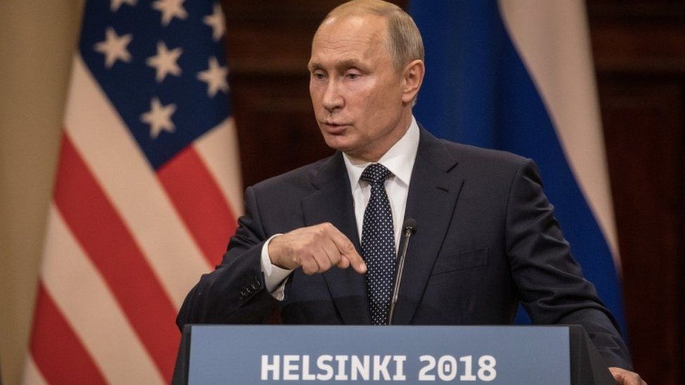 Russian President Vladimir Putin pictured during a joint press conference with Donald Trump after their Helsinki meeting