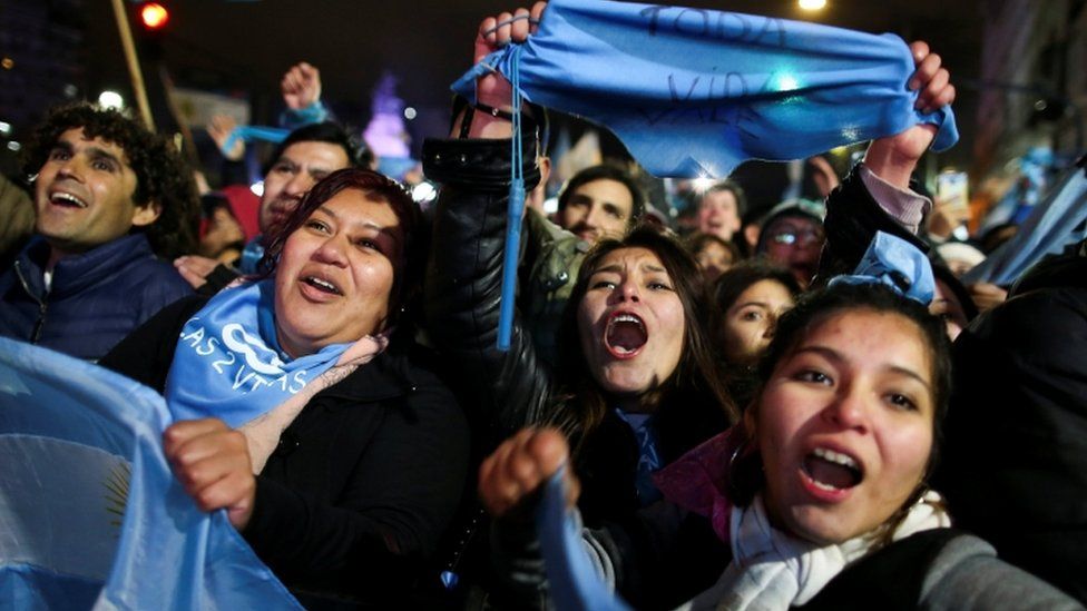 Anti-abortion activists celebrate outside parliament in Buenos Aires