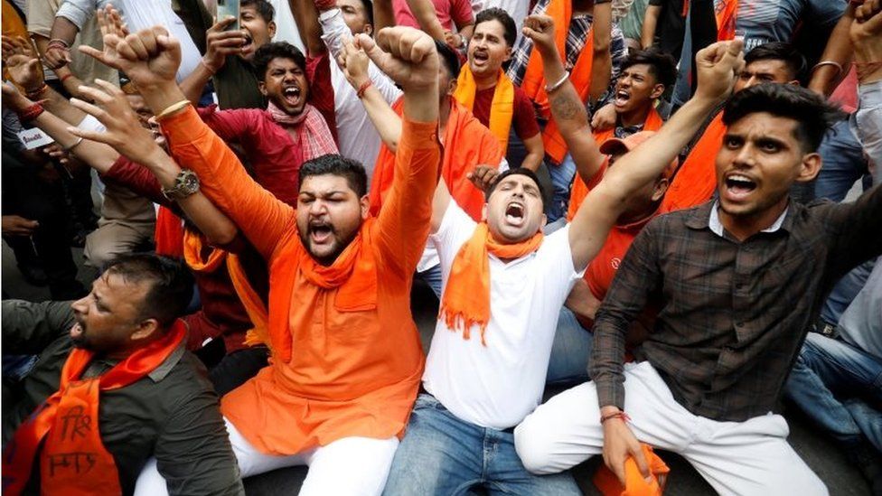 Activists of Bajrang Dal, a Hindu hardline group, shout slogans during a protest against the killing of a Hindu man in the city of Udaipur, 29 June