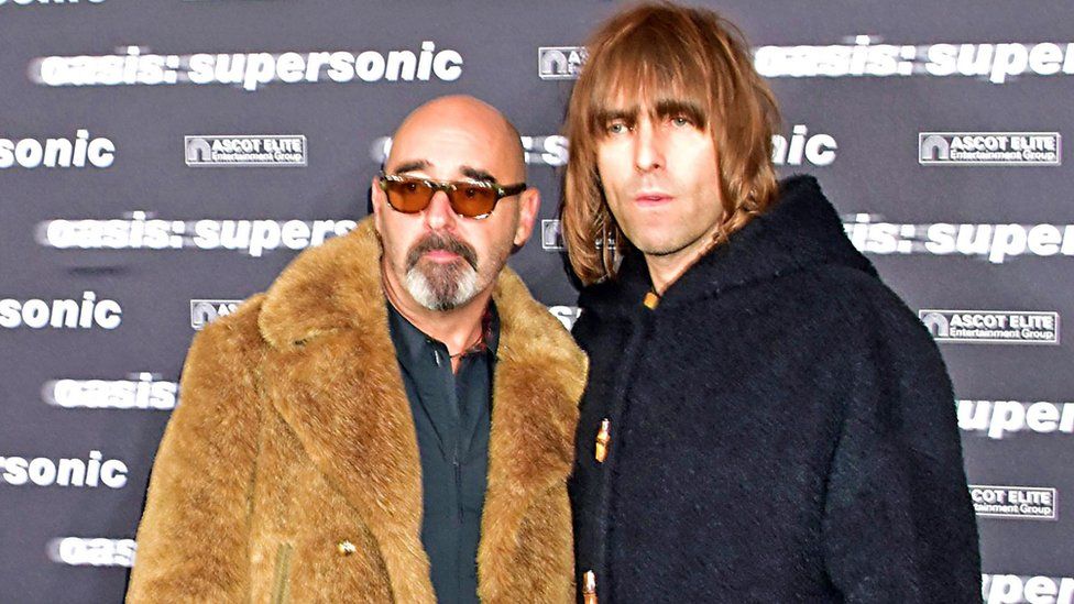 Paul Bonehead Arthurs and Liam Gallagher attend the 'Oasis: Supersonic' German Premiere In Berlin on October 27, 2016 in Berlin, Germany.