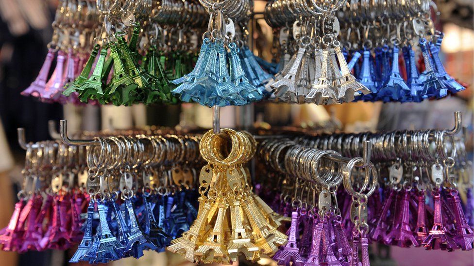 Eiffel Tower key rings are displayed in a souvenir shop of the Quartier Latin