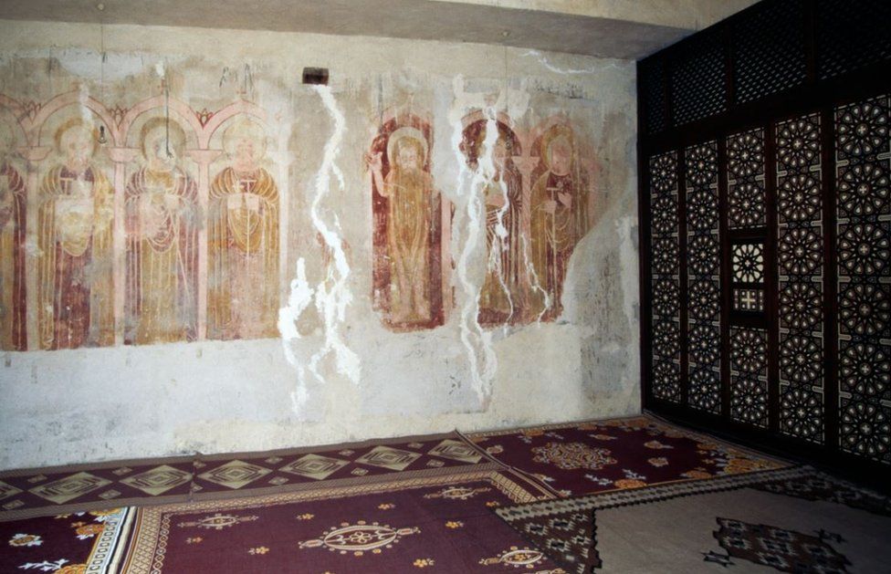 A view of the inside of the Monastery of Saint Macarius The Great, featuring faded frescoes