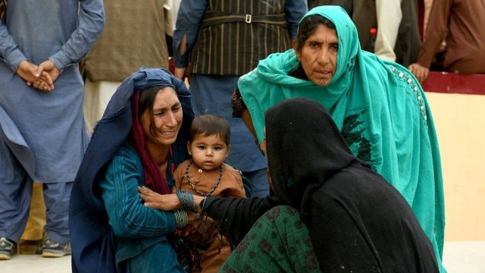 Relatives react in front of a hospital, where their family member has been transferred for treatment after a truck bomb blast in Balkh province, in Mazar-i-Sharif, Afghanistan August 25, 2020.