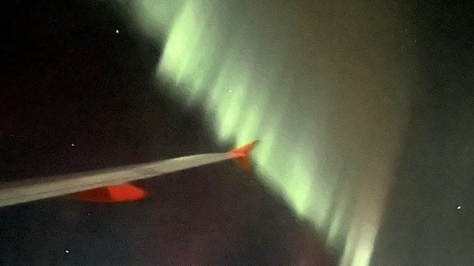 View from plane of northern lights