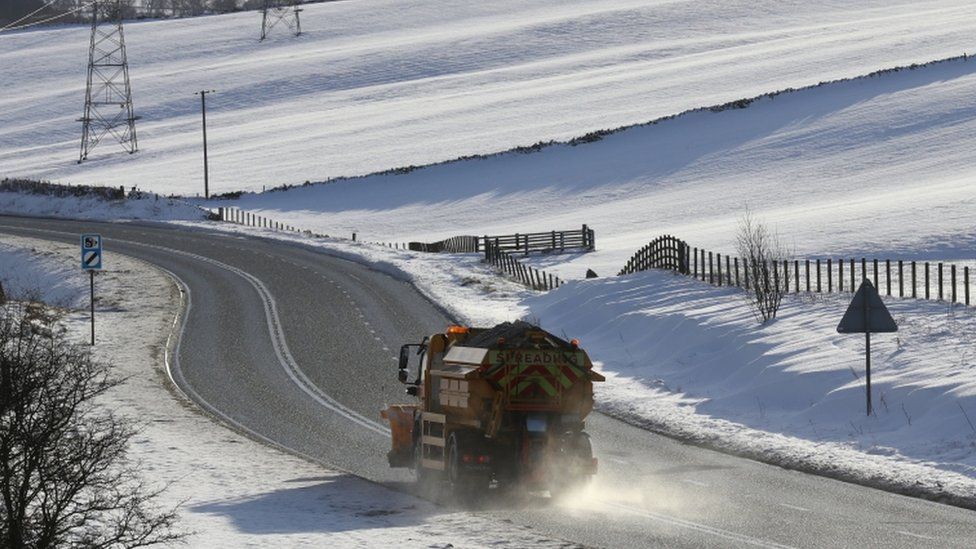 A gritter lorry on the A68 in the Scottish Borders as police are urging motorists to drive with "extreme caution" amid wintry conditions in Scotland