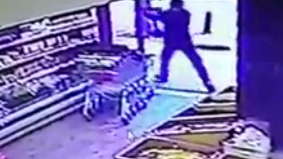 CCTV image from Tel Aviv shooting showing attacker with gun (1 January 2016)