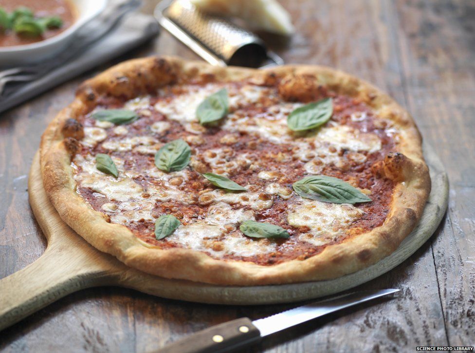A Margherita pizza - a tomato base with Mozzarella