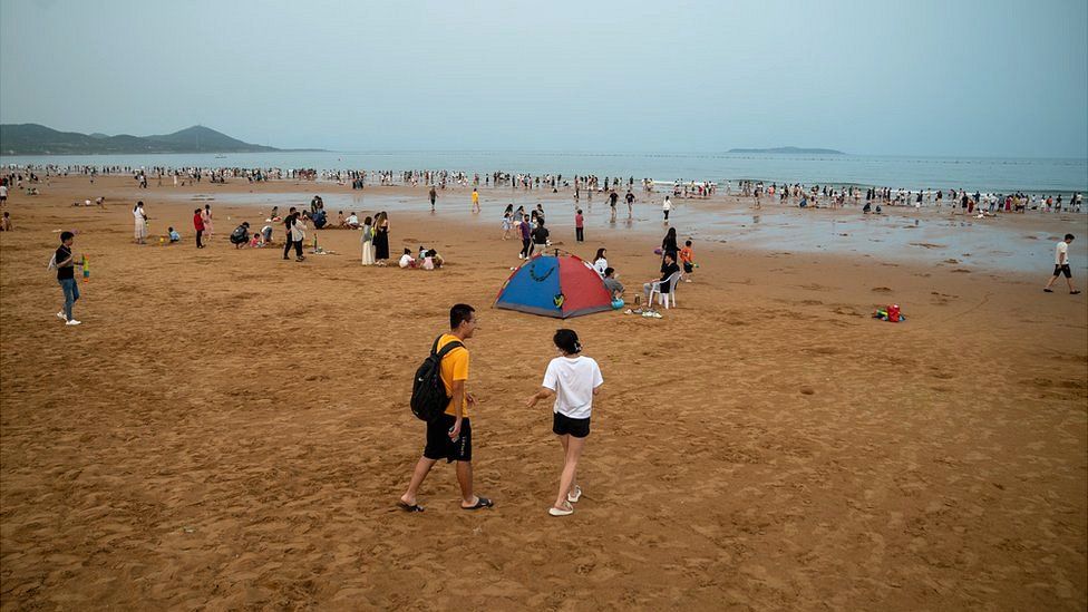 Tourists at a beach in China