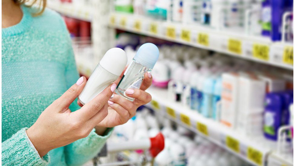 Woman shops for deodorant
