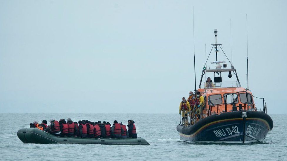 Migrants are helped by RNLI lifeboat earlier  being taken to a formation  successful  Dungeness, connected  the south-east seashore  of England