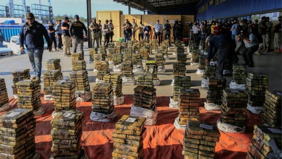 Packages of cocaine that were hidden in a shipment of six charcoal containers that were to be shipped to Israel are seen after being seized by an anti-narcotics unit in the Terport de Villeta port in Villeta near Asuncion, Paraguay October 20, 2020.