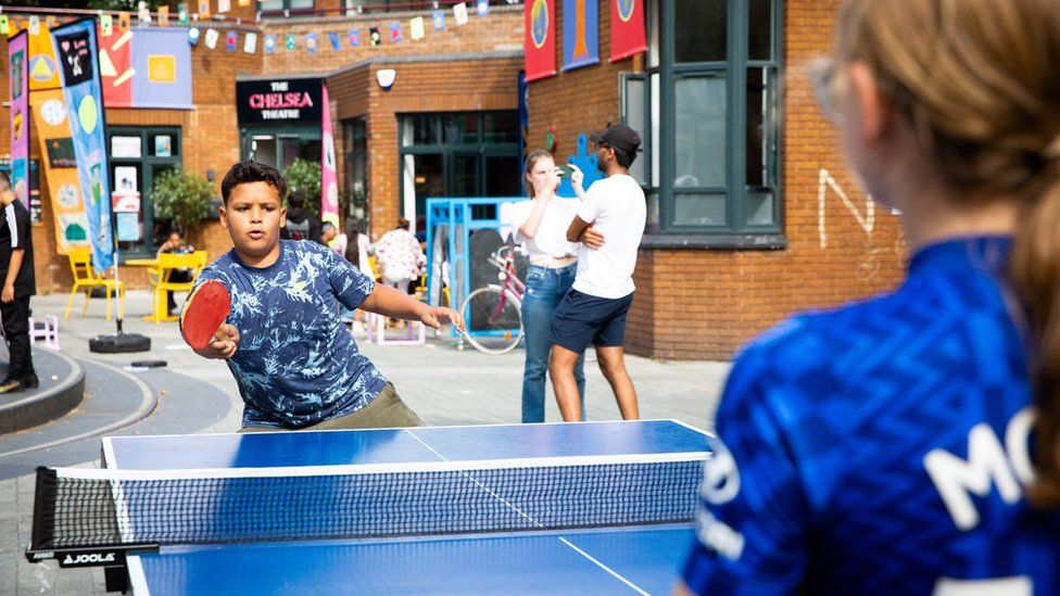 Boy exercising on a table tennis table