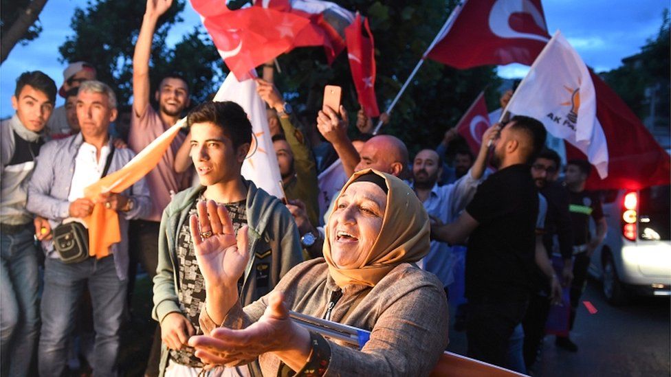 Erdogan supporters celebrate outside the AK party headquarters on 24 June 2018 in Istanbul, Turkey