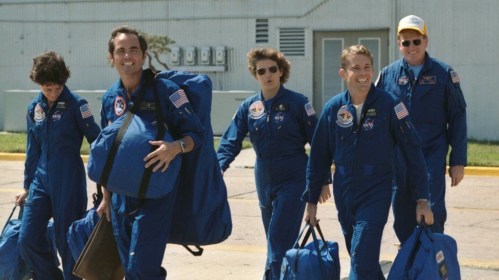 These five astronauts composed the crew for the STS-41-G mission aboard the Space Shuttle Challenger. Leading the way is Astronaut Robert L. Crippen, the crew commander. He's followed by (from left to right), Sally K. Ride, Kathryn D. Sullivan, David C. Leestma, and Jon A. McBridge.