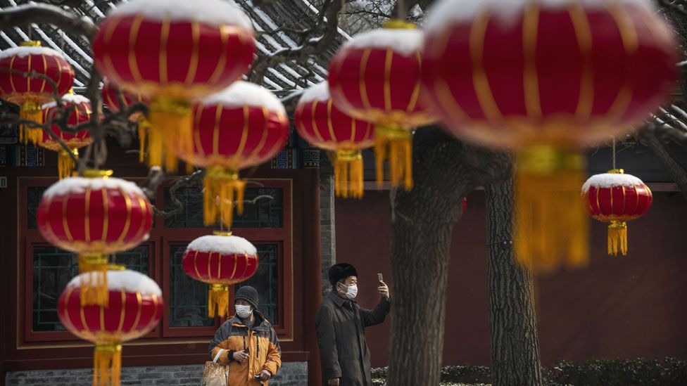 Man and woman in face masks in China