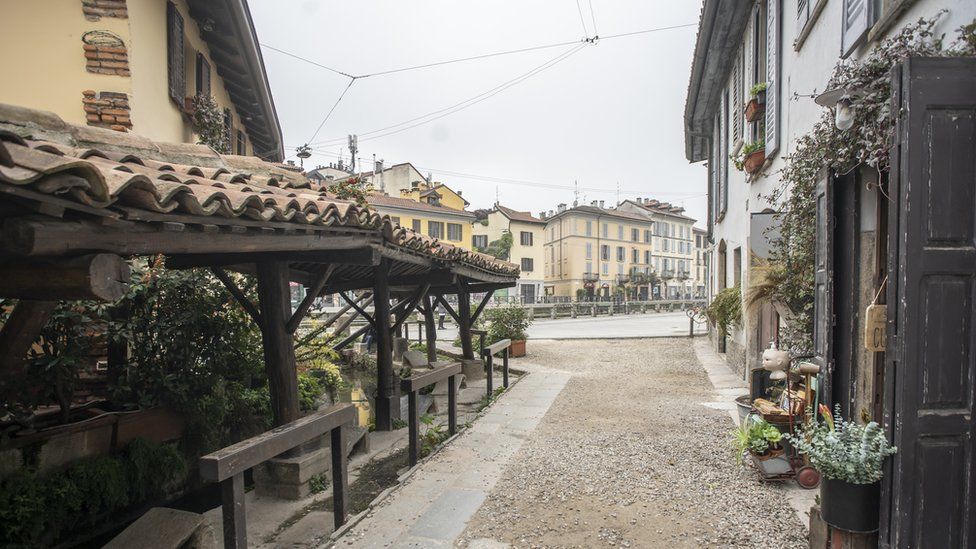 The bars and cafes in Milan's Navigli district may not be bustling for now, but by 2025 smoking will be banned here too