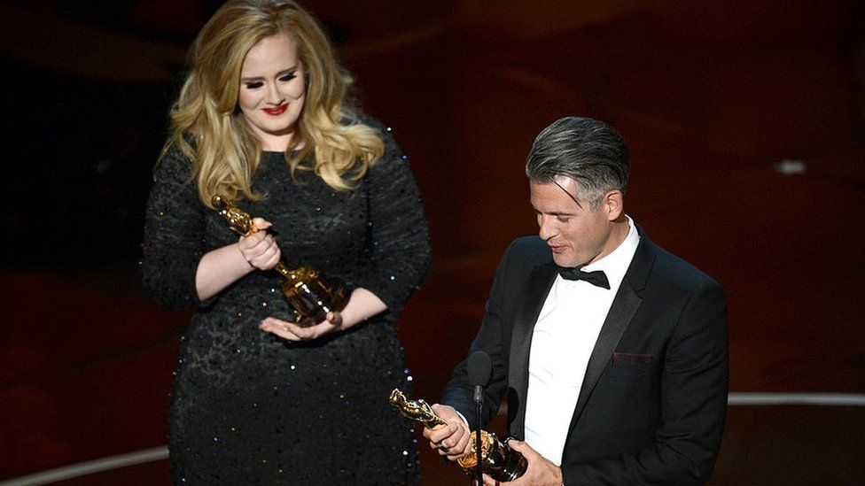 Paul Epworth and Adele at the 2013 Academy Awards