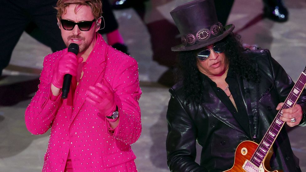Ryan Gosling and Slash perform on stage at the Oscars