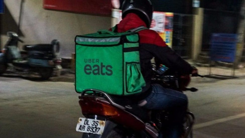 A delivery person working for Uber Eats