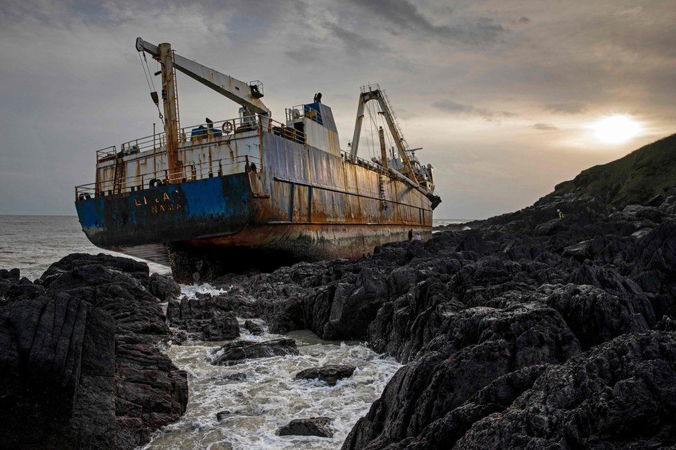 Dramatic photos show 'ghost ship' washed up by Storm Dennis BBC News