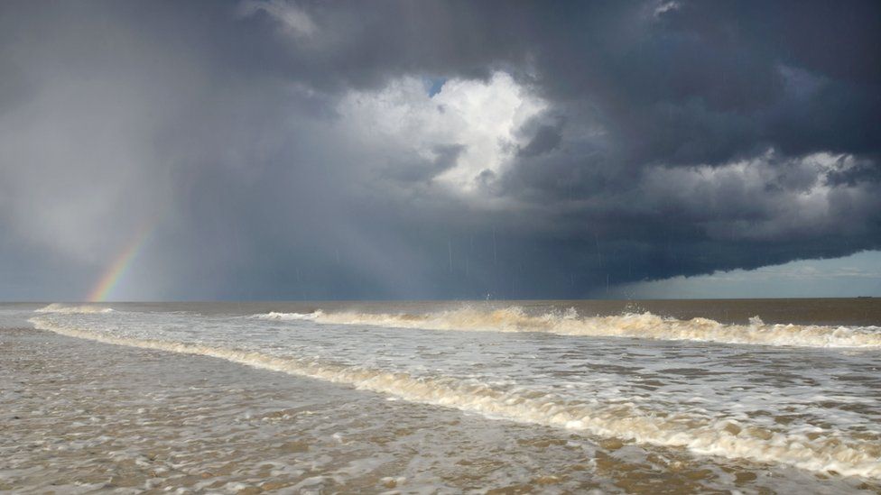 Hailstorm and rainbow over the seas of Covehithe