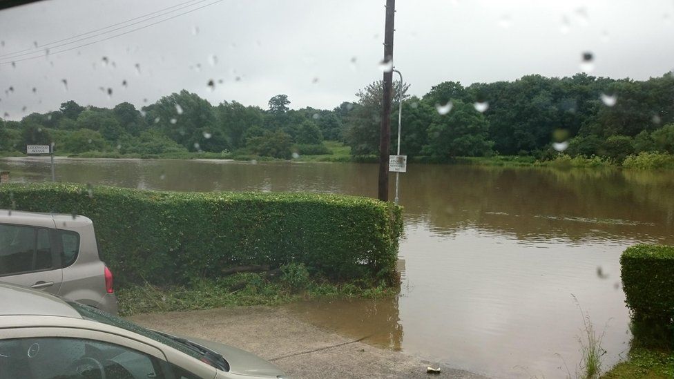 A road is flooded in Hornchurch, Essex