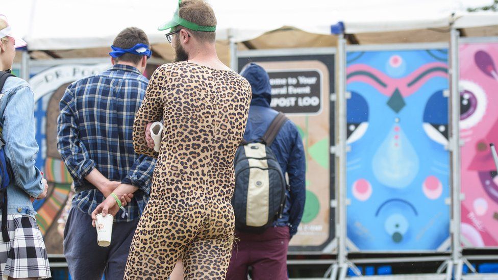 People queue for the loo at Glastonbury