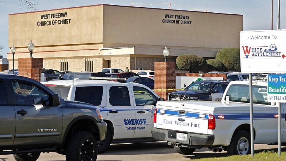 Police cars outside West Freeway Church of Christ where a shooting took place at the morning service on December 29, 2019 in White Settlement, Texas