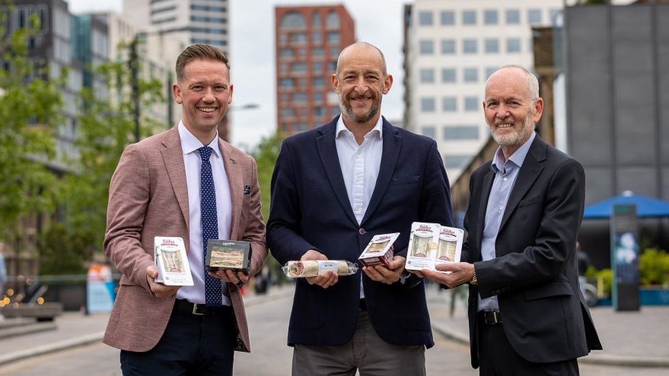 Daniel Silverston, Managing Director of The Soho Sandwich Company, Gareth Chambers, CEO of Around Noon Foods, and Howard Farquhar, Chairman of Around Noon, announce the deal in London.