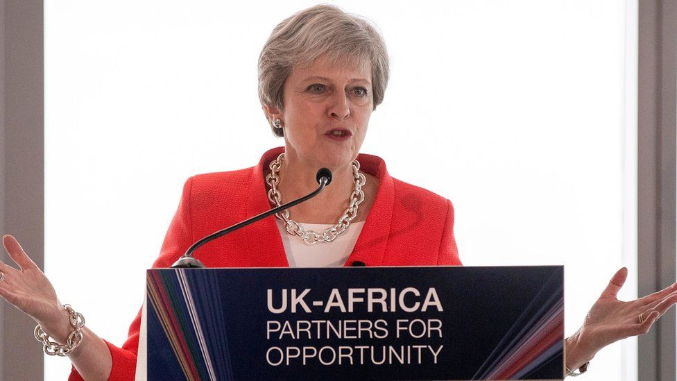 Theresa May at a press conference in South Africa