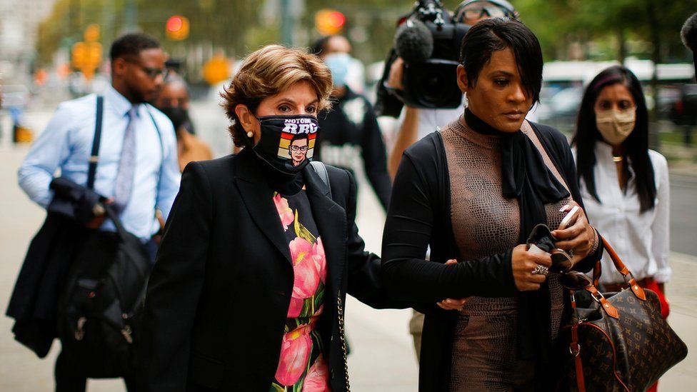 Lawyer Gloria Allred (L) and a relative of Jocelyn Savage pictured outside the Brooklyn federal court on Wednesday