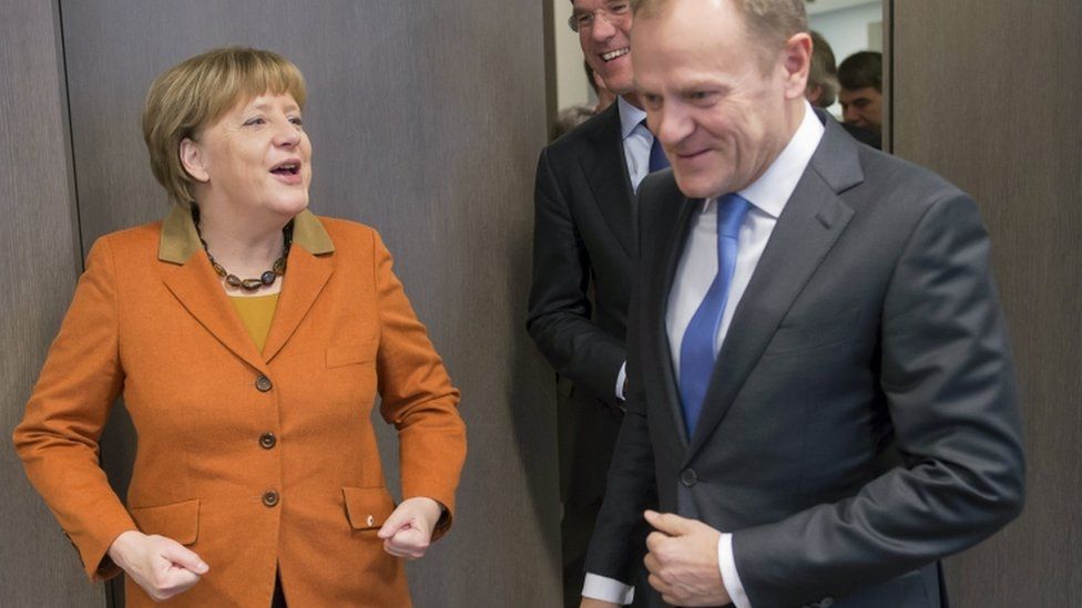 German Chancellor Angela Merkel and European Council President Donald Tusk attend a bilateral meeting during a EU-Turkey summit in Brussels