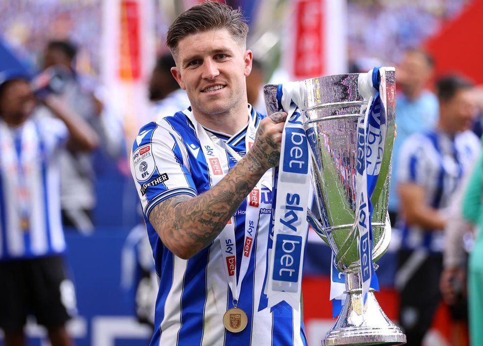 Hull City legend Dean Windass's pride as son Josh repeats his triumph - BBC News