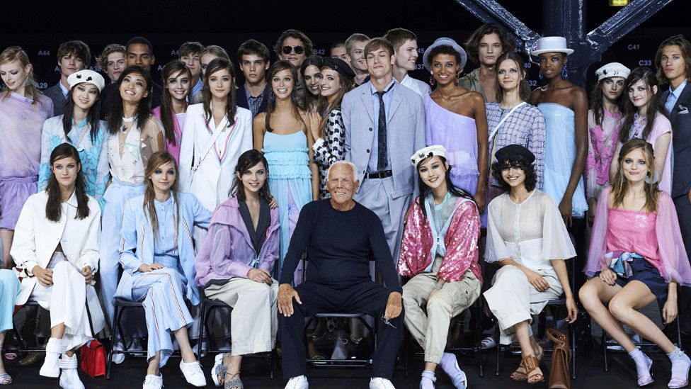 Giorgio Armani with models from his LFW show