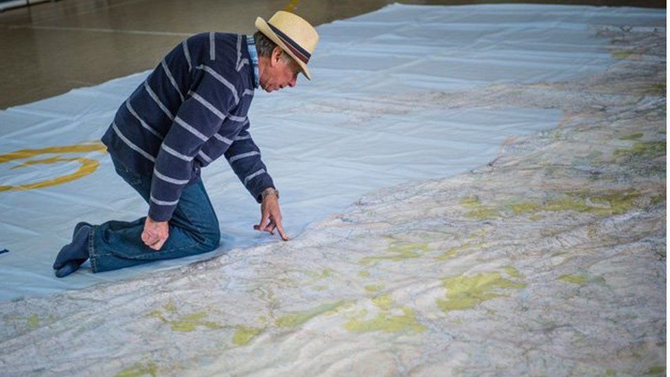 Man on a giant Ordnance map