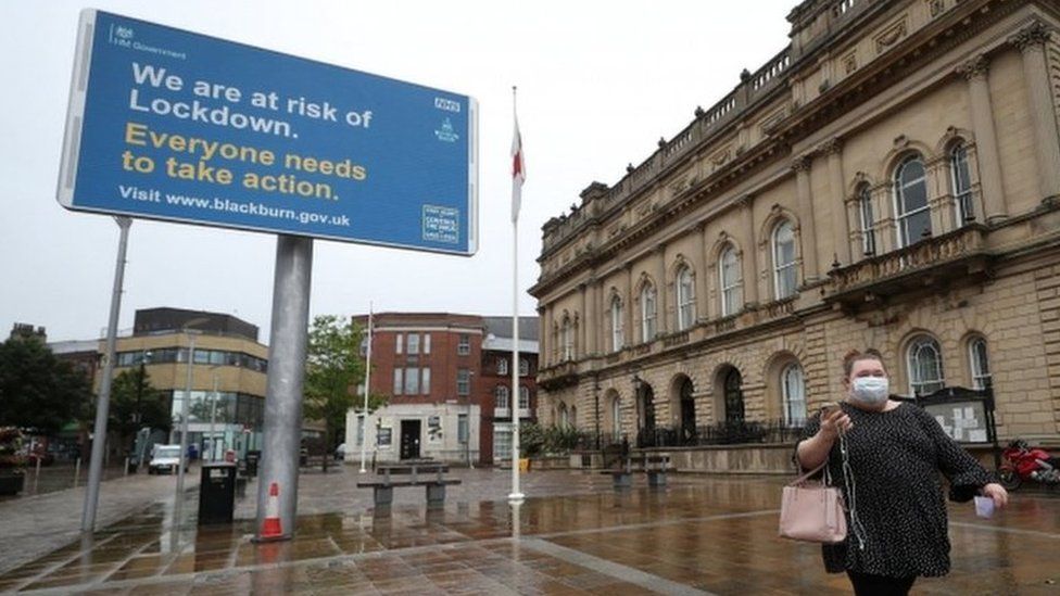 Coronavirus advisory notice on a billboard outside Blackburn Town Hall,