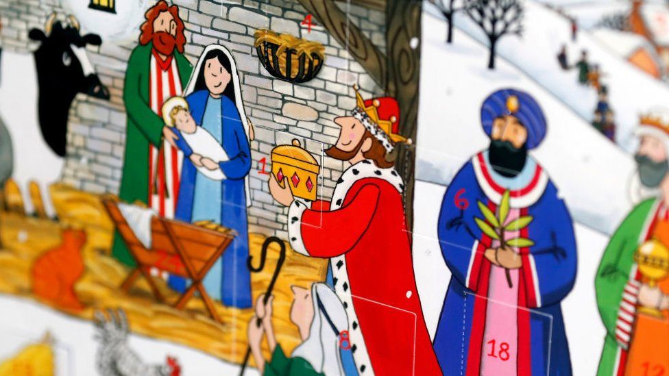A seasonal Advent calendar for the countdown for Christmas depicts the birth of Jesus in Bethlehem